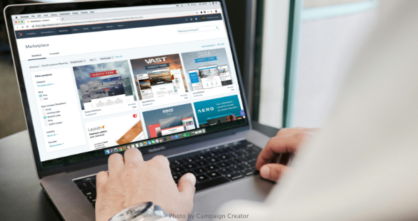 Professional reviewing an online business profile on a laptop