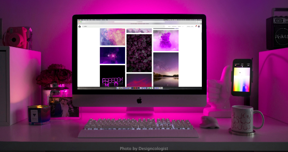 Creative professional using specialist tools at a computer workstation